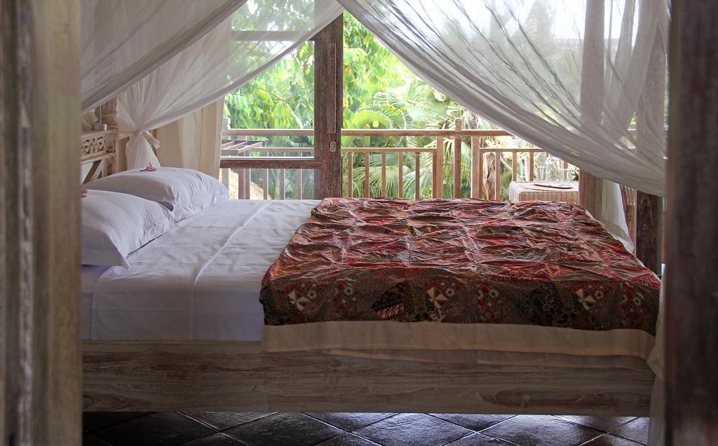 Papaya Guesthouse Canggu Habitación foto